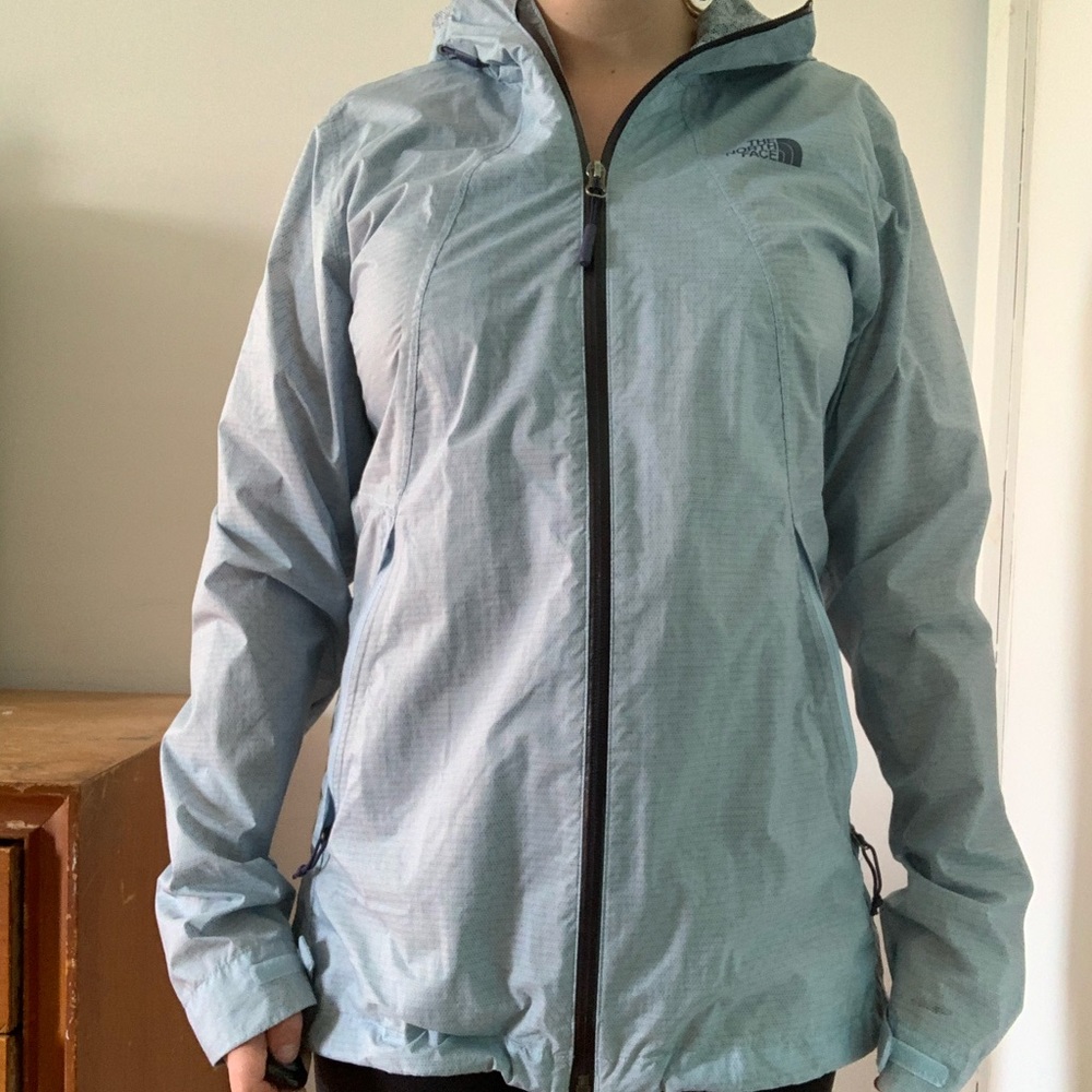 Light blue North Face windbreaker
